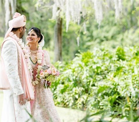 A bride and groom looking at one another