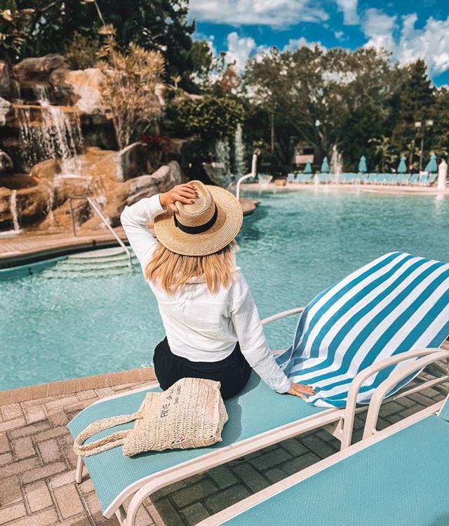 woman sitting at loch ness pool
